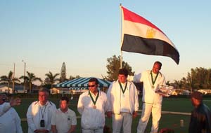 Photo of the top three players on the rostrum with an Egyptian flag.
